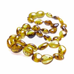 Knotted baby amber necklace ~ Green bean beads